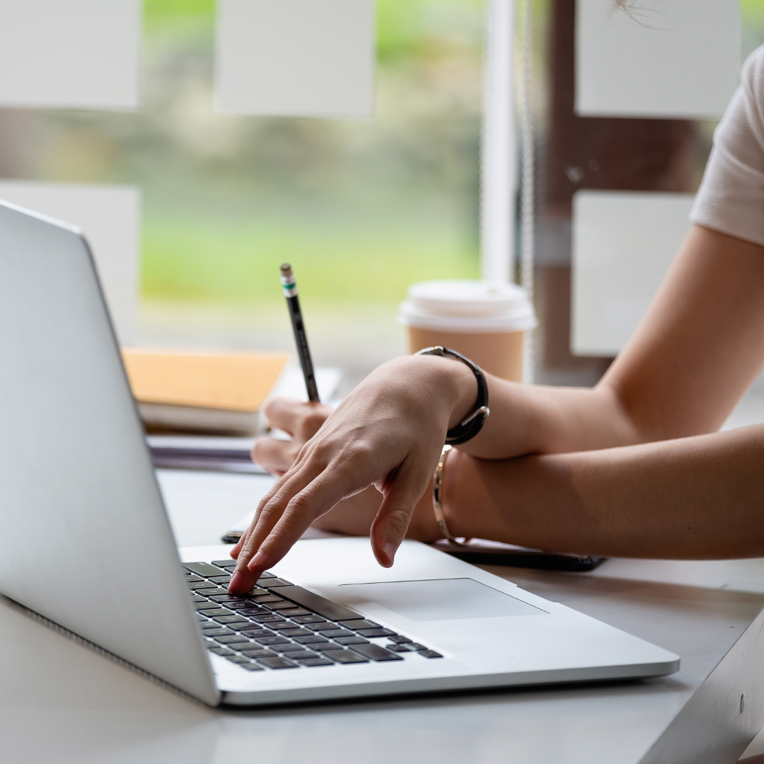 Online Training Person studying at a laptop